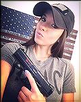 Nice photo of a girl with an HK VP9.