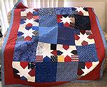 A quilt presented to me in a Court of Valor ceremony.  All veterans in our retirement community received one, although the patterns differed.